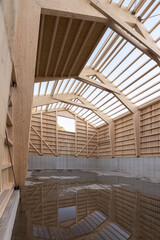 Construction of a hay shed with constructive timber construction and concrete with laminated beams