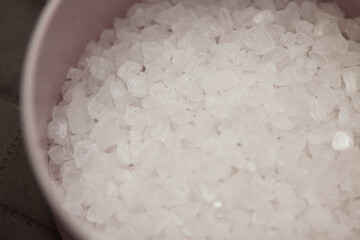 Close-up white rock salt background. 