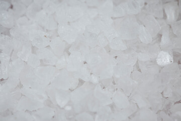Close-up white rock salt background. 