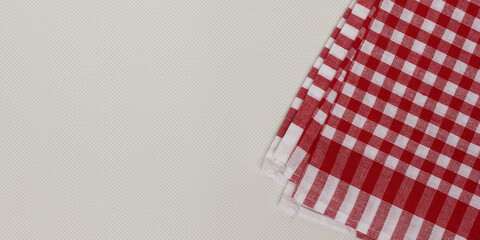 Flat lay composition with red checkered towel.