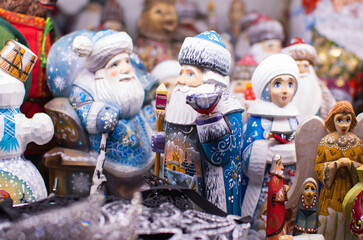 White Christmas ornaments,market store - Christmas decorations shelf.collection of Christmas fairy baubles. Shining new year toys.decorative gold balls in store.