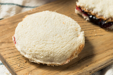 Obraz na płótnie Canvas Healthy Homemade Crustless Peanut Butter Jelly Sandwich