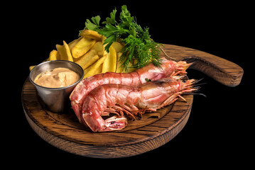 shrimp, sauce and potato on black