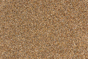 Brown grain texture. Color noise backdrop. Granule pattern. Grainy drops effect backdrop.