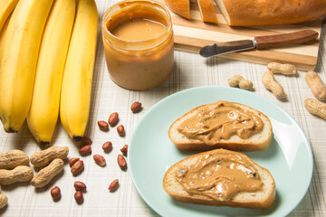 Peanut butter and banana sandwiches. I'm making lunch, a peanut butter sandwich.
