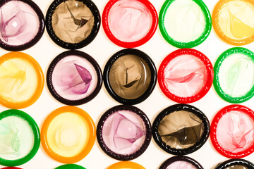 Colorful condoms background.