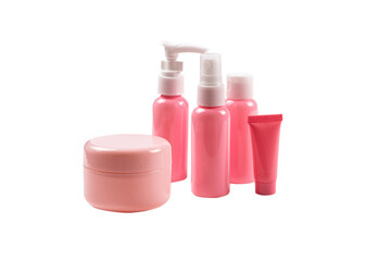 Pink plastic bottles for hygiene products, cosmetics, hygiene products on a white background. Copy space.