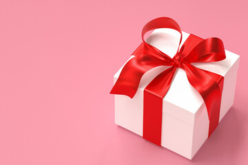White gift box 3d with red ribbon and bow on pink background