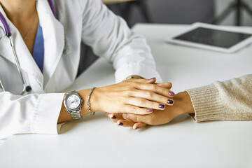 young woman doctor takes patient in office
