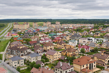 Fototapeta na wymiar private houses in the suburban neighborhood, top view