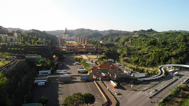 Aerial drone sunset view of Fo Guang Shan Buddha Museum in Kaohsiung, Taiwan.
Mid angle, parallax movement, HD.