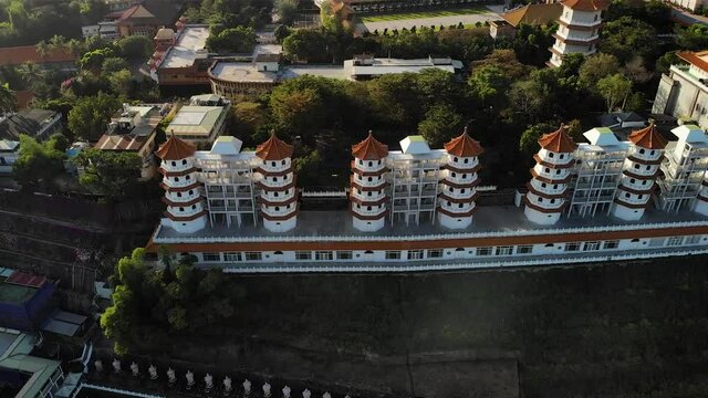 Aerial drone sunset view of Fo Guang Shan Buddha Museum in Kaohsiung, Taiwan.
Low angle, traveling movement, HD.