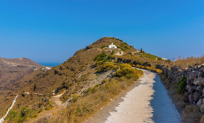 A view along the path on the Caldera rim in Santorini in summertime