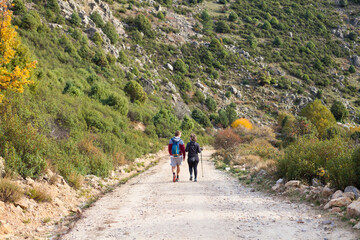 Fototapeta premium One couple hiking in the mountains