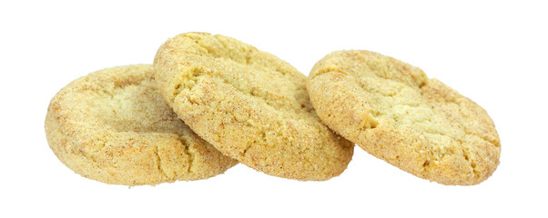 Side view of three gluten free Snickerdoodle cookies isolated on a white background.