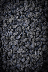 Dark blue raisins, natural healthy sweets for children