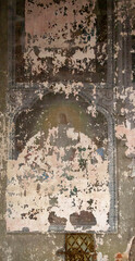old painting on the walls of an abandoned temple