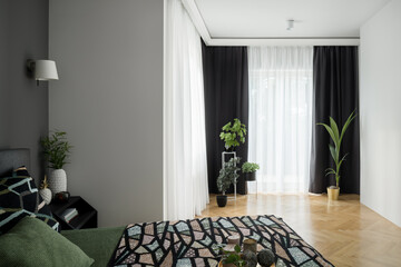 Big bedroom with window walls
