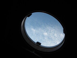 moon in the sky,  porthole