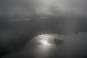 Aerial view of lake through a fog