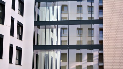 Obraz premium Modern European residential apartment buildings quarter. Abstract architecture, fragment of modern urban geometry.