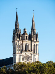 Obraz premium Angers Cathedral is a Roman Catholic church in Angers, a city located in western France. View on the facade. Sunny day, blue sky.