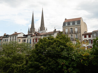View on the city of Bayonne, a commune and one of the two sub-prefectures of the department of Pyrénées-Atlantiques, France. Cathedral towers in the background.