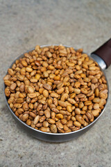 Small pot with raw beans