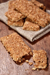  Crunchy granola bars on a wooden background   