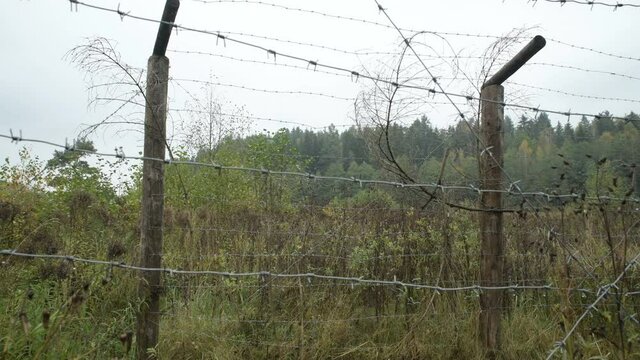 Old wooden observation tower barbed wire barrier battlefield world great patriotic war wwii ww2 eastern front USSR Soviet Union CIS Belarus partisan guerilla fight battle for freedom history historic