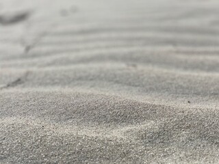 Sand on beach and desert with soft focus background