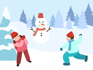 Children playing snowball fight in the snow