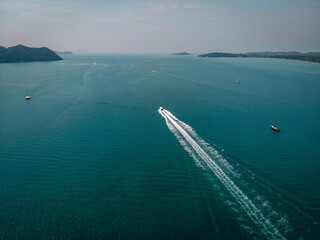 speed Boat/ yacht at sea leaving a wake, aerial view