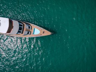 aerial top down view of travel ship nose part in the open Andaman sea. Phuket. Thailand..