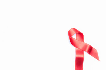 Breast cancer woman. Red ribbon symbol in hiv world day isolated on white background. Awareness aids and cancer. Healthcare and medical concept.