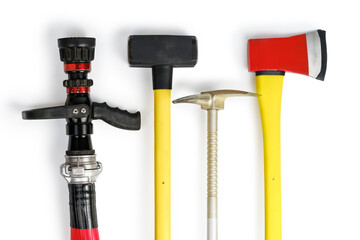 Large yellow sledgehammer, axe, hooligan and fire hose from fireman's toolbox isolated on white background. Top view, flatlay