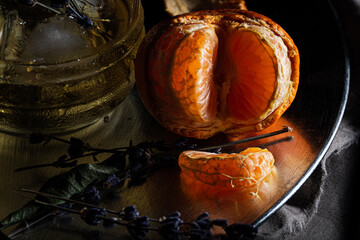 Ripped mandarine on moody shot
