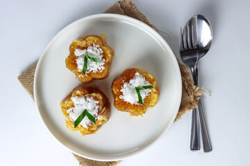 Sawut, Indonesian traditional snack made from steamed shredded cassava, palm sugar and grated coconut.
