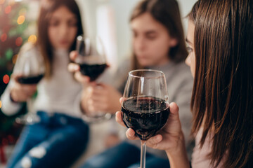 Teenage girls at a party having fun at home celebrating together