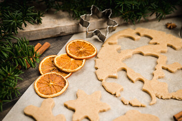 Making gingerbread cookies before Christmas. Christmas traditions. Christmas decorations.