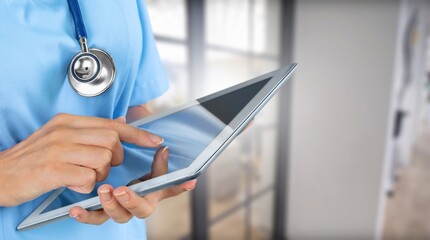 Doctor at hospital working with tablet pc