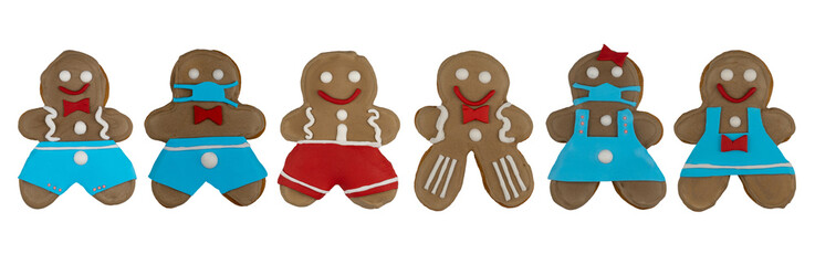 collection of gingerbread men on a white background. Homemade classic Christmas cookies, sweet treats and gifts. set of gingerbread. handmade sweetness. banner, top view
