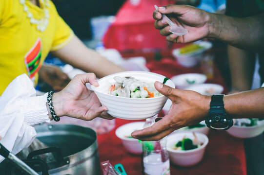 Volunteers Share Food To The Poor: Concept Of Food Sharing For The Poor To Alleviate Hunger