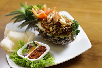 Pineapple fried rice with shrimp topping