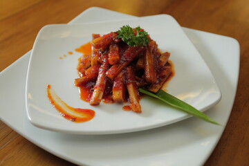 Balado potatoes with a pretty dish