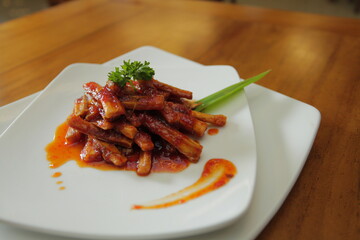 Balado potatoes with a pretty dish