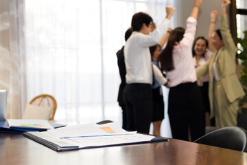 Office workers are expressing confidence after the planning meeting is over.