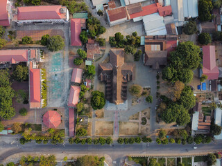 Fototapeta na wymiar Aerial view of Go (Wooden) Church in the city of Kon Tum in the Central Highlands of Vietnam is an ancient relic with unique wooden architecture of high aesthetic value