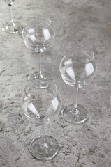 Empty bar glass on gray stone table.