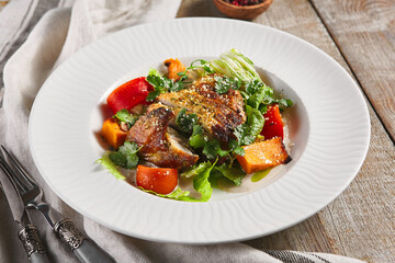 Chicken fillet with baked vegetable salad